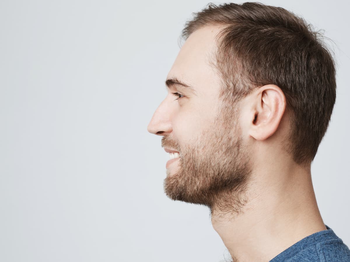 close up profile of stylish smiling attractive mal 2026 03 09 09 19 02 utc (1)